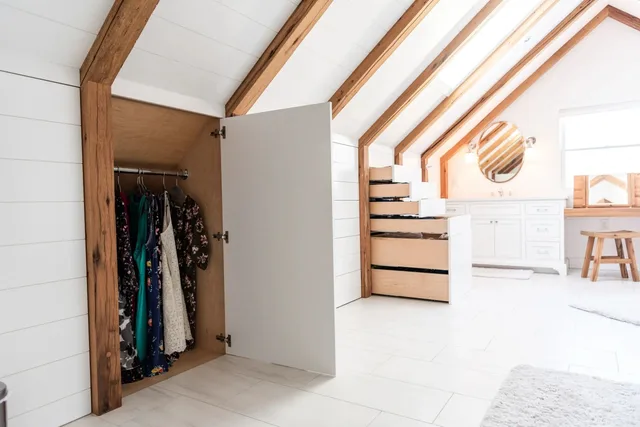 Built-Ins & Furniture: attic bath closet with exposed beams and pull-out drawers, Built-Ins & Furniture