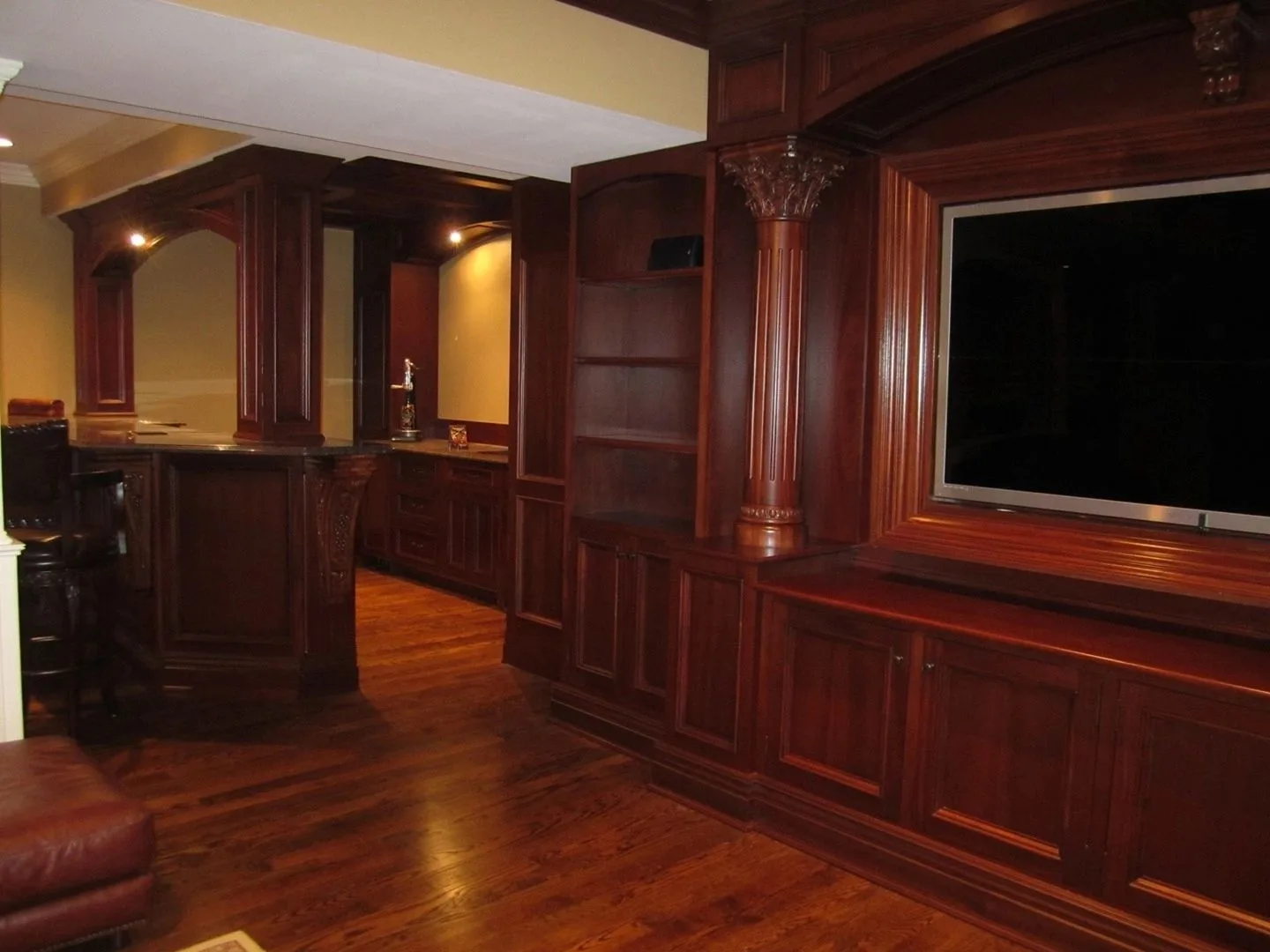 cherry paneled room with columns and bar, Paneled Rooms