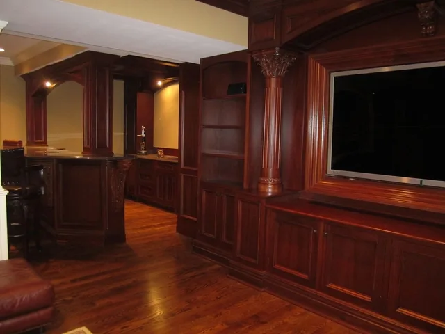 cherry paneled room with columns and bar, Paneled Rooms